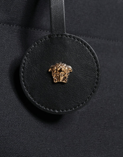 Bolso tote cruzado de mano Versace negro de lona y cuero con logo