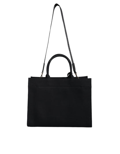 Bolso tote cruzado de mano Versace negro de lona y cuero con logo