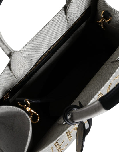 Bolso tote cruzado de lona y cuero con asa superior, logo y color blanco de Versace