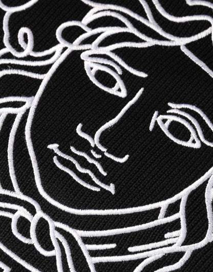 Suéter Versace negro con cuello redondo y logo Medusa bordado