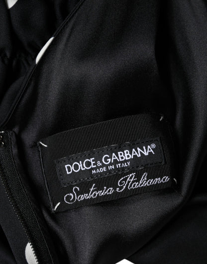 Vestido midi de seda negra con lunares, escote en V y borlas de Dolce & Gabbana