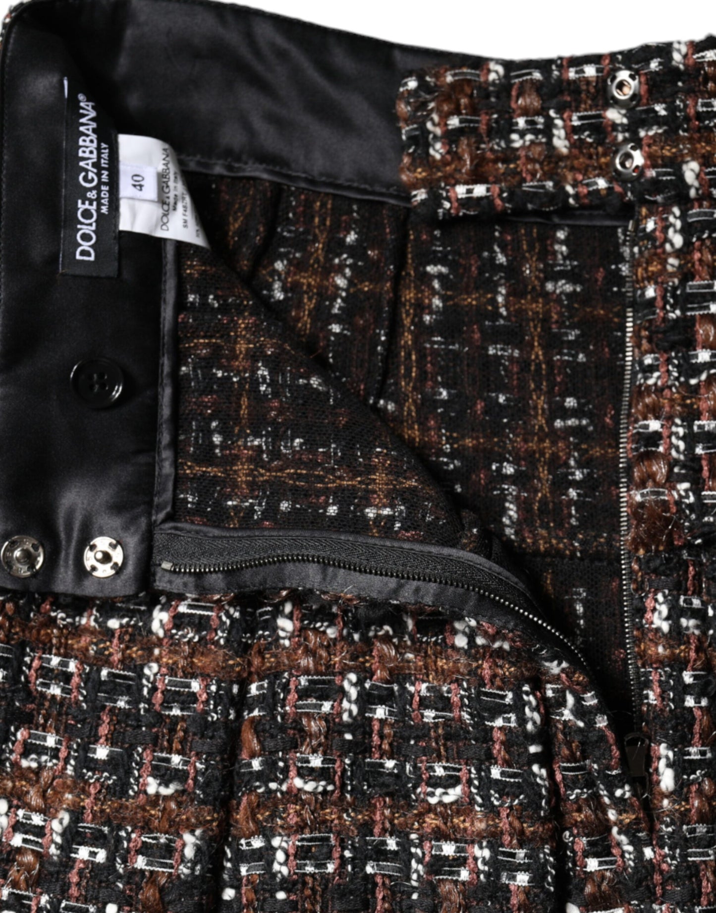 Minifalda multicolor de tweed tartán de talle alto de corte A de Dolce & Gabbana