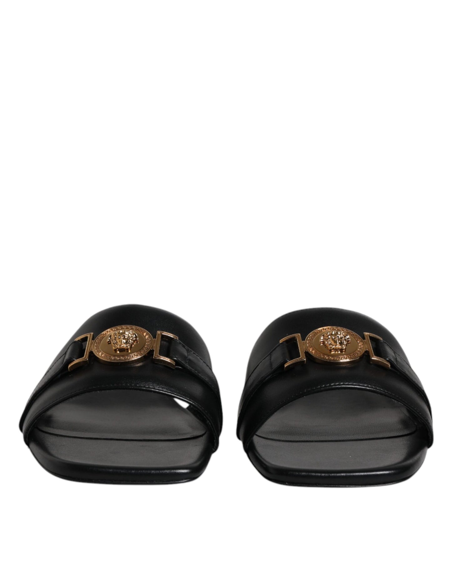 Versace Zapatillas Destalonadas Planas de Cuero Negro con Placa del Logo