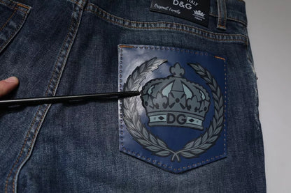 Vaqueros ajustados de algodón con el logotipo DG Crown azul de Dolce & Gabbana