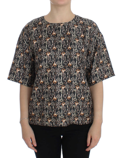 Blusa de seda gris con estampado de llave dorada Dolce & Gabbana