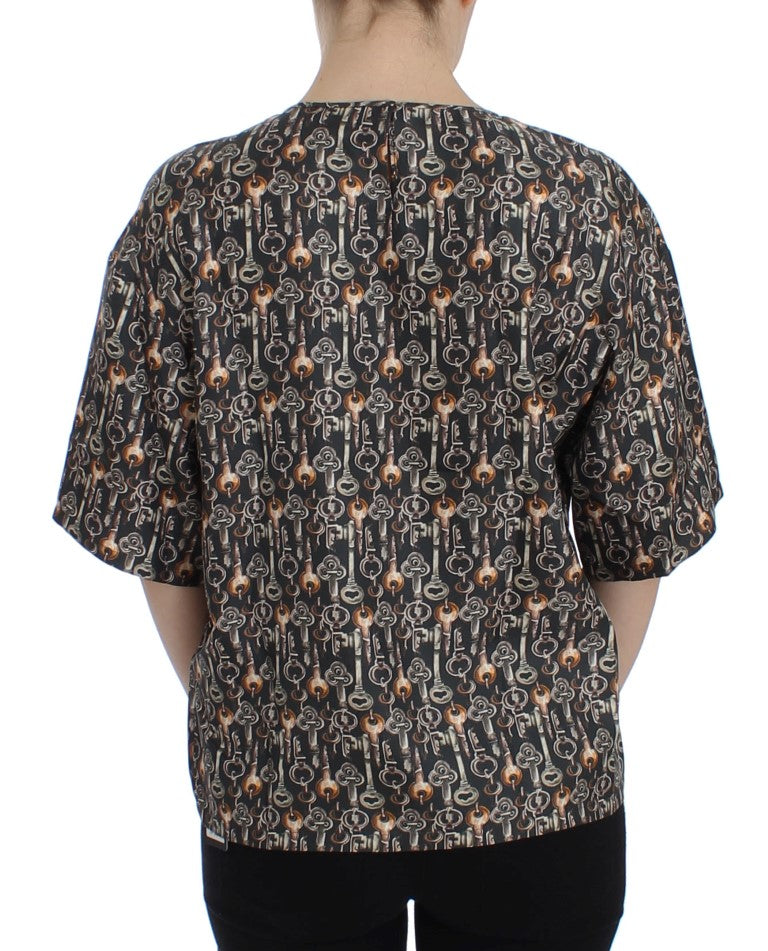 Blusa de seda gris con estampado de llave dorada Dolce & Gabbana