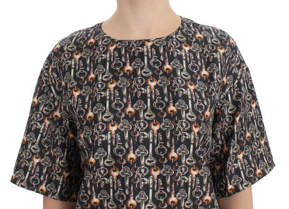 Blusa de seda gris con estampado de llave dorada Dolce & Gabbana