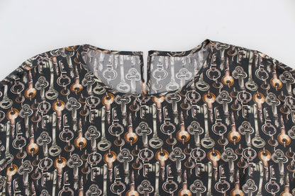 Blusa de seda gris con estampado de llave dorada Dolce & Gabbana