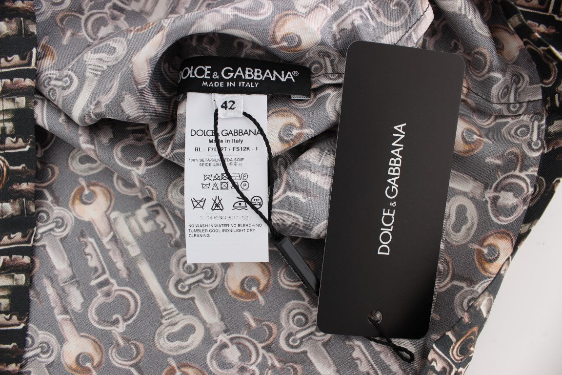 Blusa de seda gris con estampado de llave dorada Dolce & Gabbana