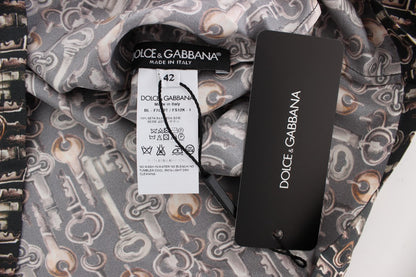 Blusa de seda gris con estampado de llave dorada Dolce & Gabbana