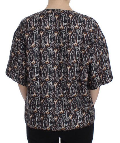 Blusa de seda gris con estampado de llave dorada Dolce & Gabbana