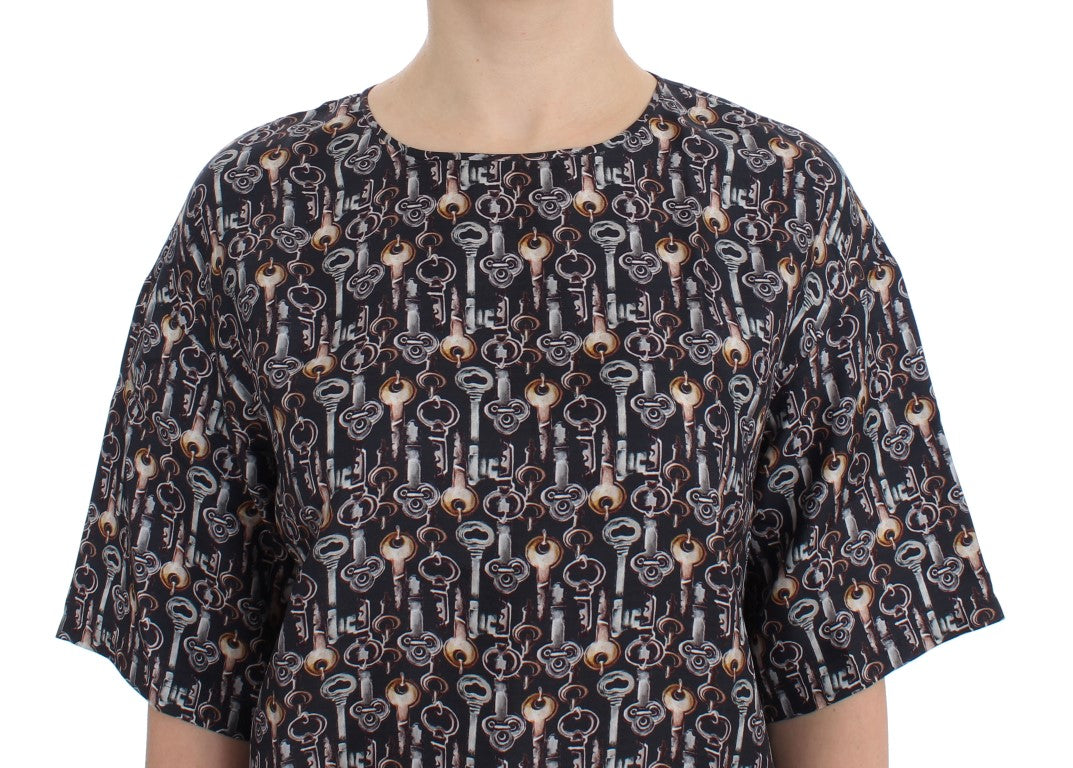 Blusa de seda gris con estampado de llave dorada Dolce & Gabbana