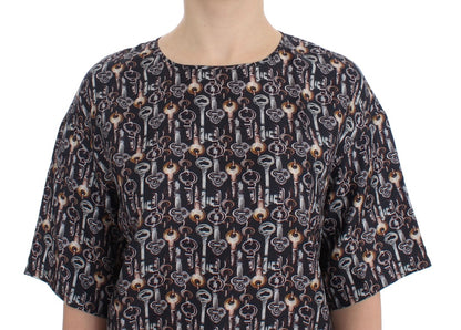 Blusa de seda gris con estampado de llave dorada Dolce & Gabbana