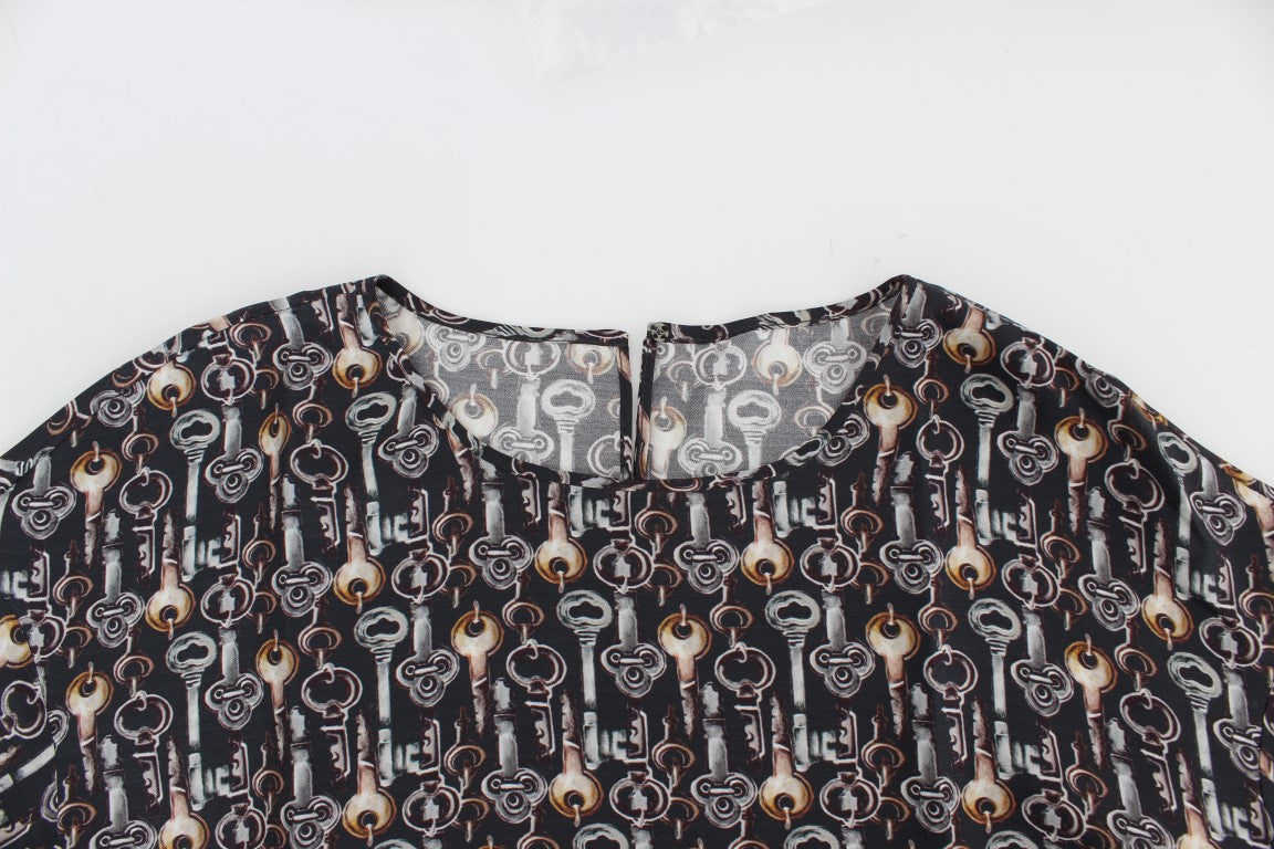 Blusa de seda gris con estampado de llave dorada Dolce & Gabbana