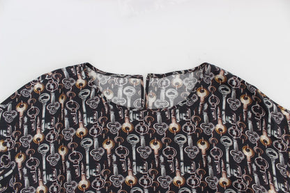 Blusa de seda gris con estampado de llave dorada Dolce & Gabbana