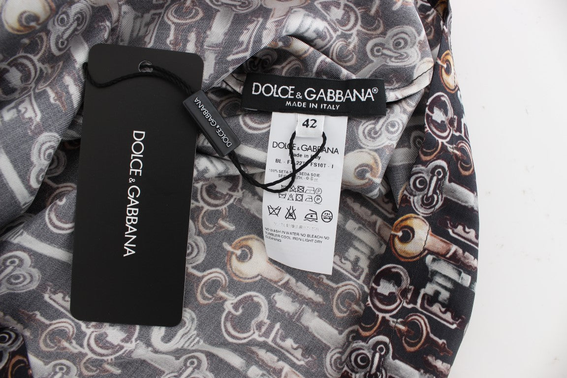 Blusa de seda gris con estampado de llave dorada Dolce & Gabbana