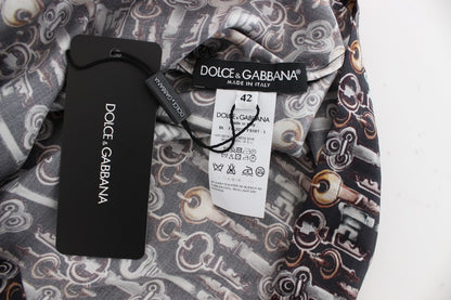 Blusa de seda gris con estampado de llave dorada Dolce & Gabbana