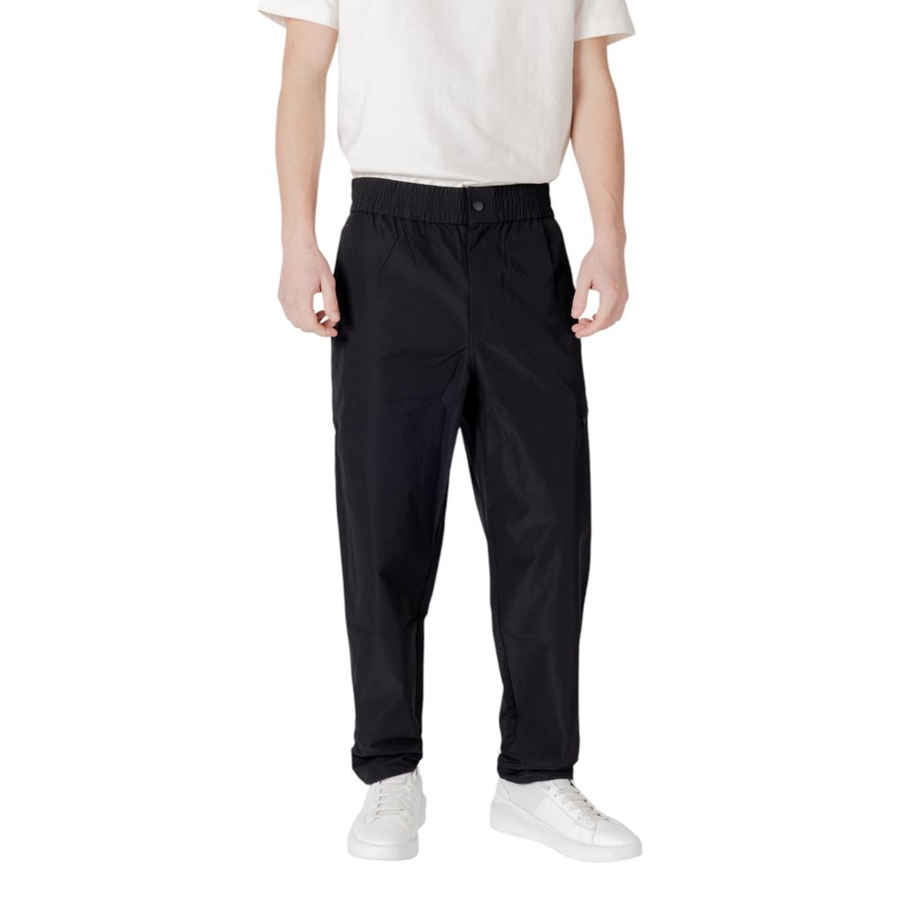Pantalones casuales Calvin Klein Jeans de poliéster negro