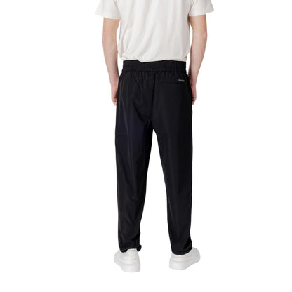 Pantalones casuales Calvin Klein Jeans de poliéster negro