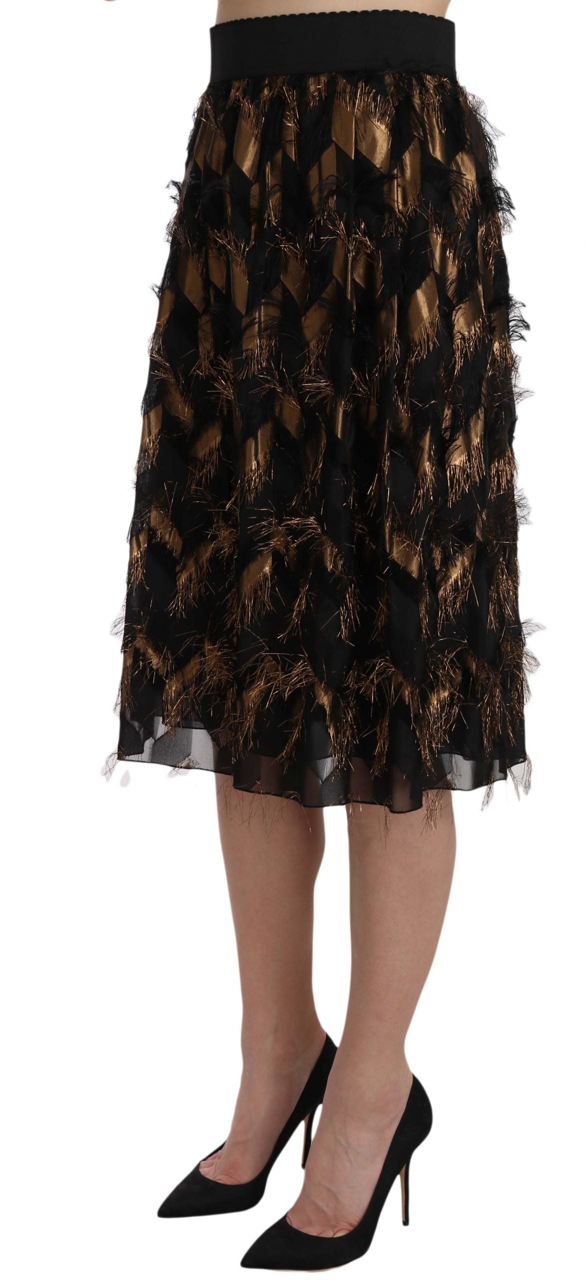 Falda lápiz acampanada metálica con flecos negra y dorada de Dolce & Gabbana
