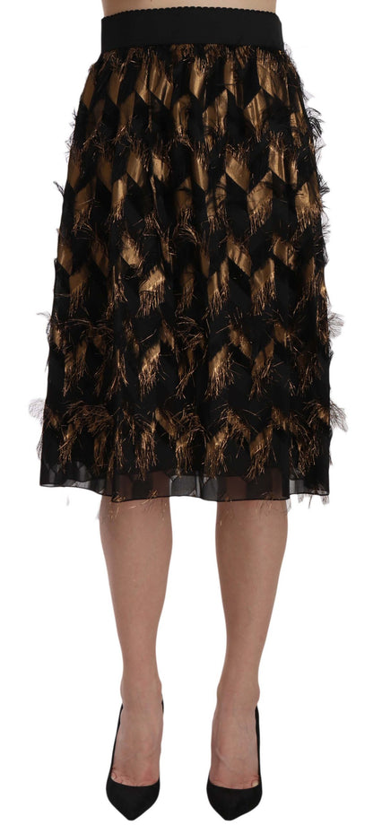 Falda lápiz acampanada metálica con flecos negra y dorada de Dolce & Gabbana