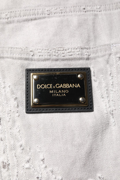 Pantalones cortos vaqueros bermuda desgastados de color gris claro para hombre de Dolce & Gabbana