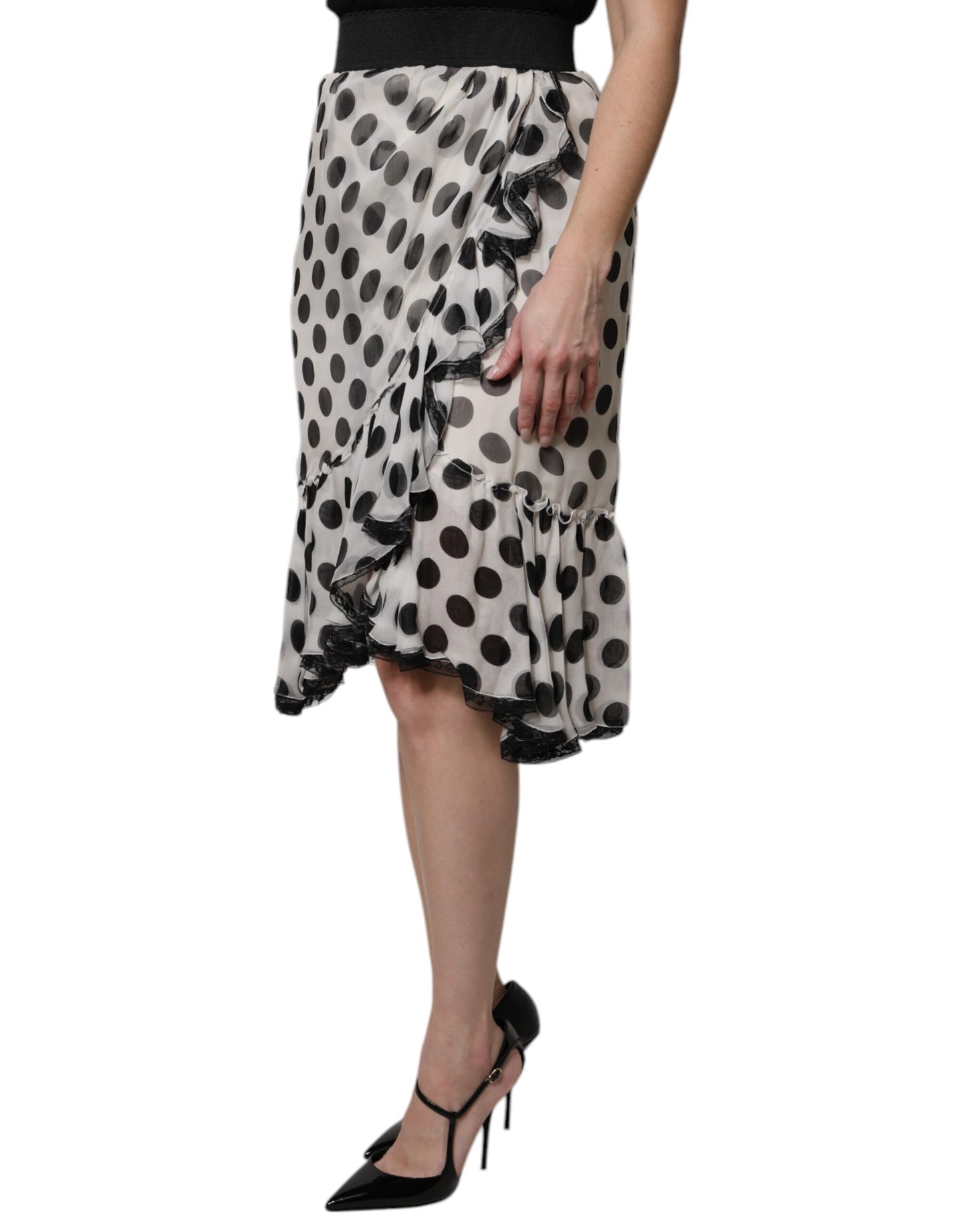 Falda de Dolce & Gabbana blanca y negra con lunares, hasta la rodilla