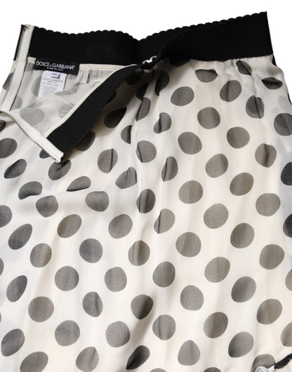 Falda de Dolce & Gabbana blanca y negra con lunares, hasta la rodilla