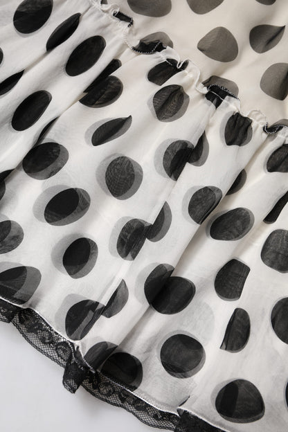 Falda de Dolce & Gabbana blanca y negra con lunares, hasta la rodilla