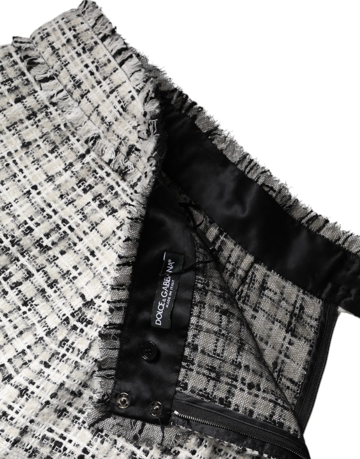 Minifalda Dolce & Gabbana de tweed tartán blanca y negra de talle alto