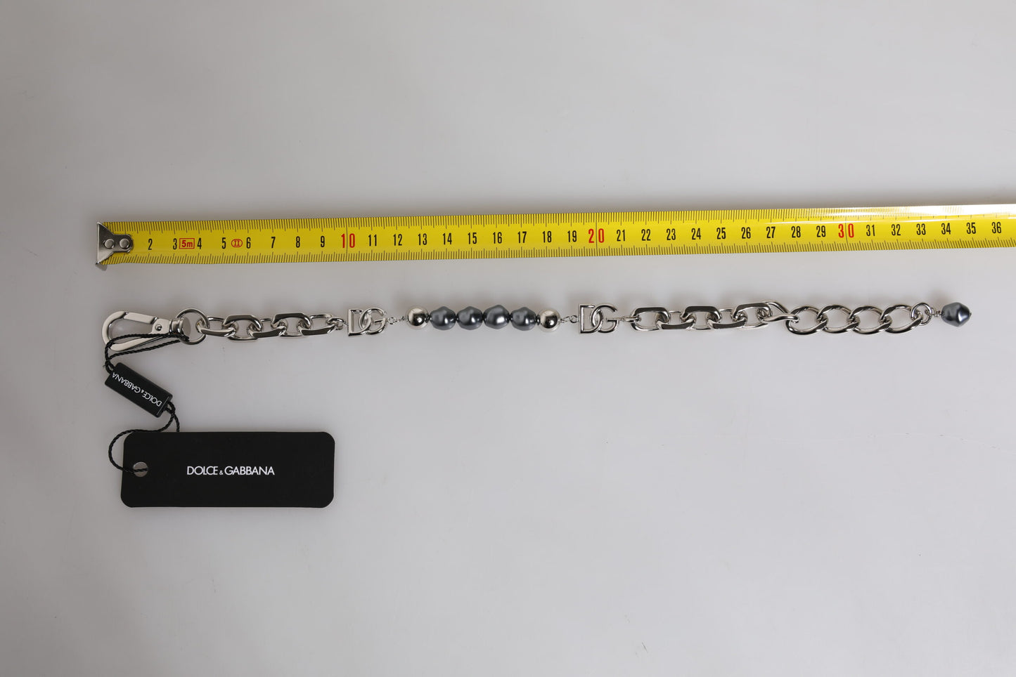 Pulsera Dolce & Gabbana de cadena plateada con broche de langosta y perlas grises