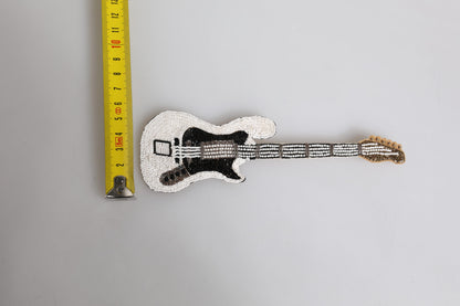 Broche de alfiler de guitarra con logo de latón dorado y abalorios Dolce & Gabbana