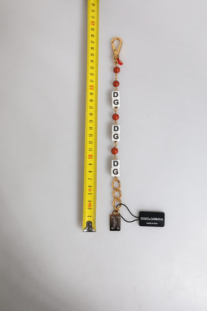 Pulsera con dados DG de Dolce & Gabbana en latón dorado multicolor con cadena