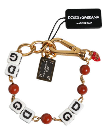 Pulsera con dados DG de Dolce & Gabbana en latón dorado multicolor con cadena