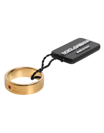Anillo Dolce & Gabbana de latón dorado con cristales rojos y logo DG