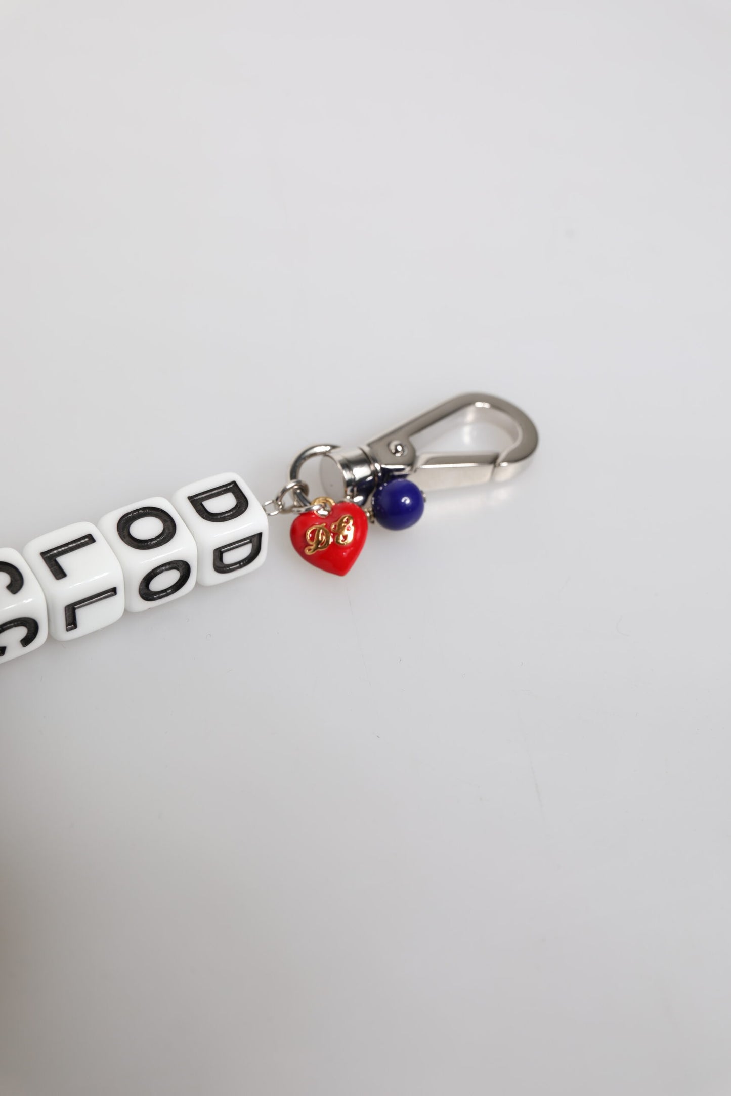 Pulsera con dije de dados de latón plateado con logo y adornos de Dolce & Gabbana