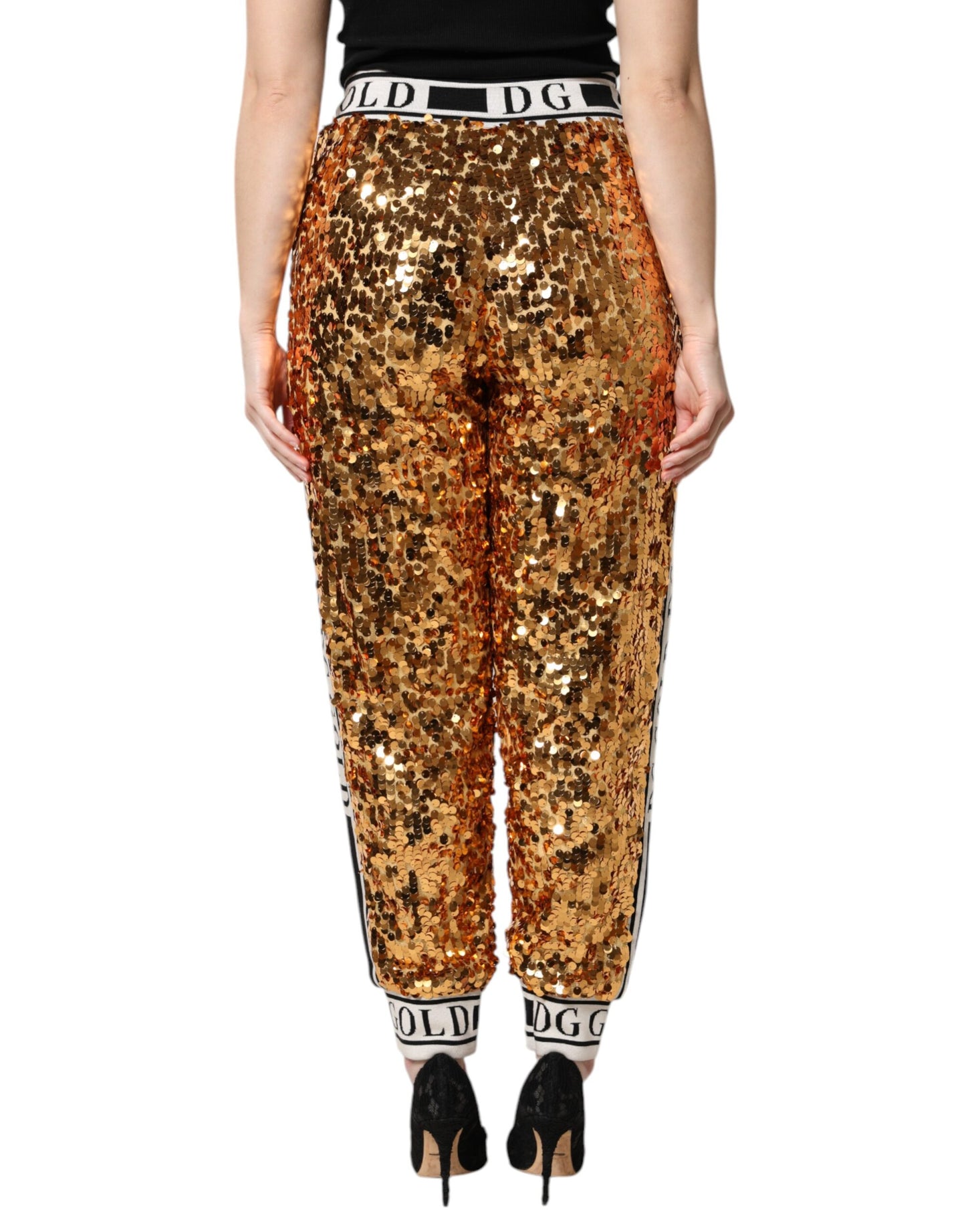 Pantalones jogger con lentejuelas y logotipo DG metálico dorado de Dolce & Gabbana