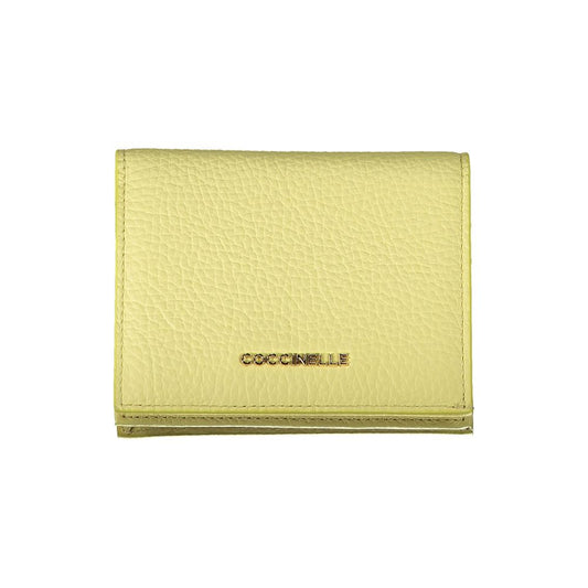Cartera de mujer de piel amarilla Coccinelle