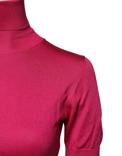 Top corto de cuello alto de punto de seda rosa de Dolce & Gabbana