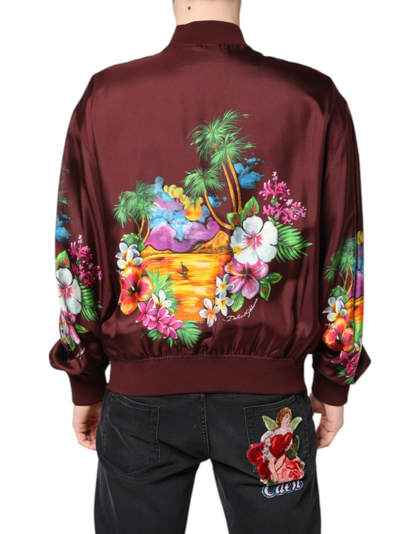 Chaqueta bomber de Dolce & Gabbana en color granate con estampado floral y cremallera completa