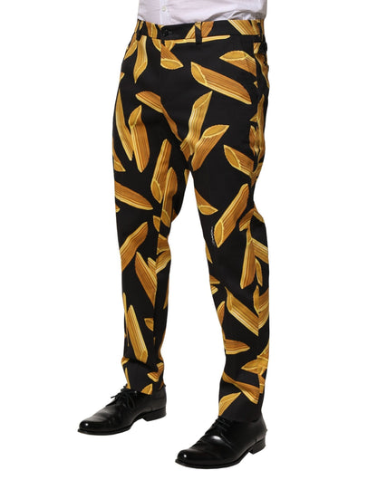 Pantalones cónicos de hombre negros con estampado de pasta de Dolce & Gabbana