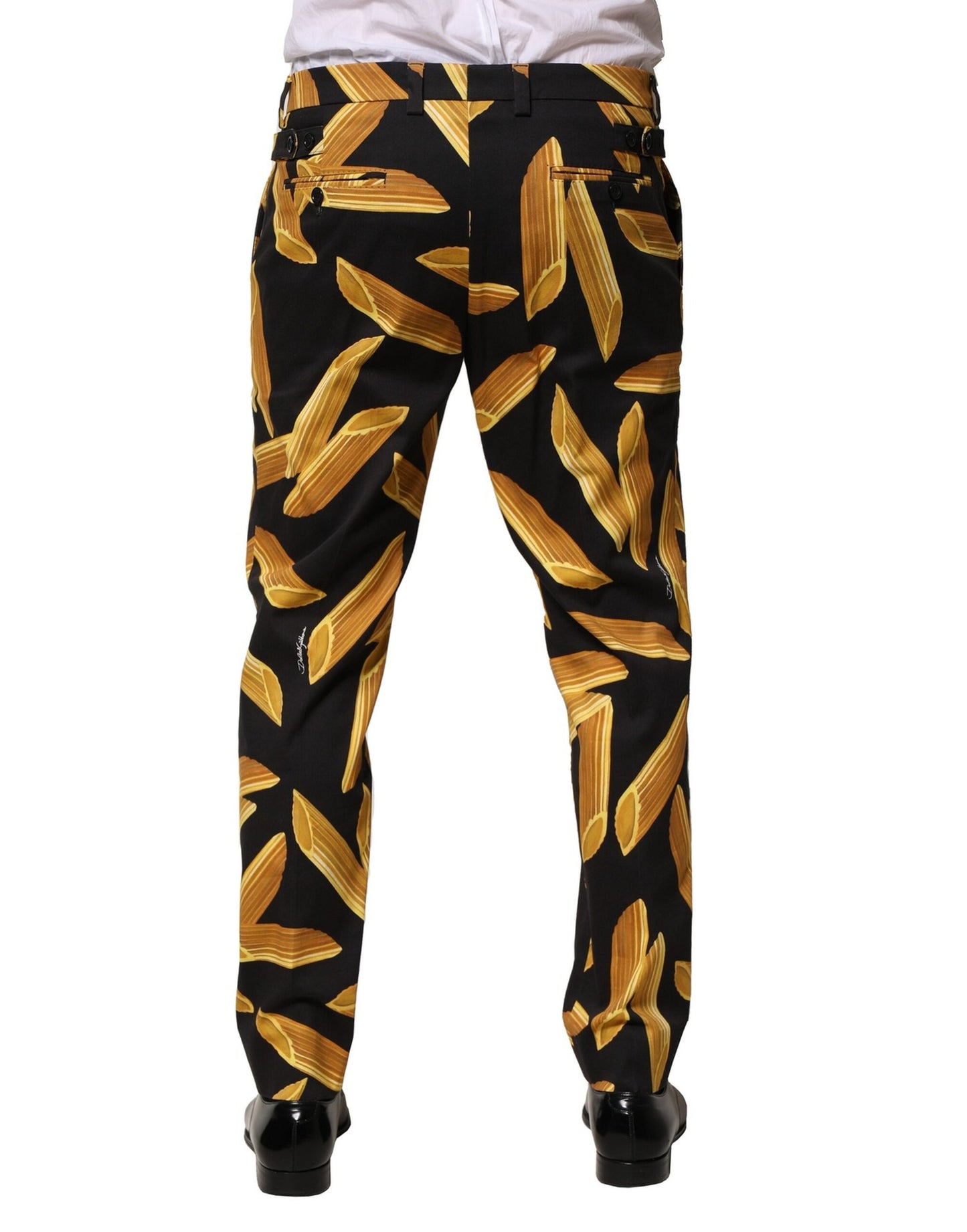Pantalones cónicos de hombre negros con estampado de pasta de Dolce & Gabbana