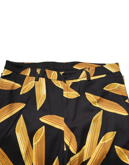 Pantalones cónicos de hombre negros con estampado de pasta de Dolce & Gabbana