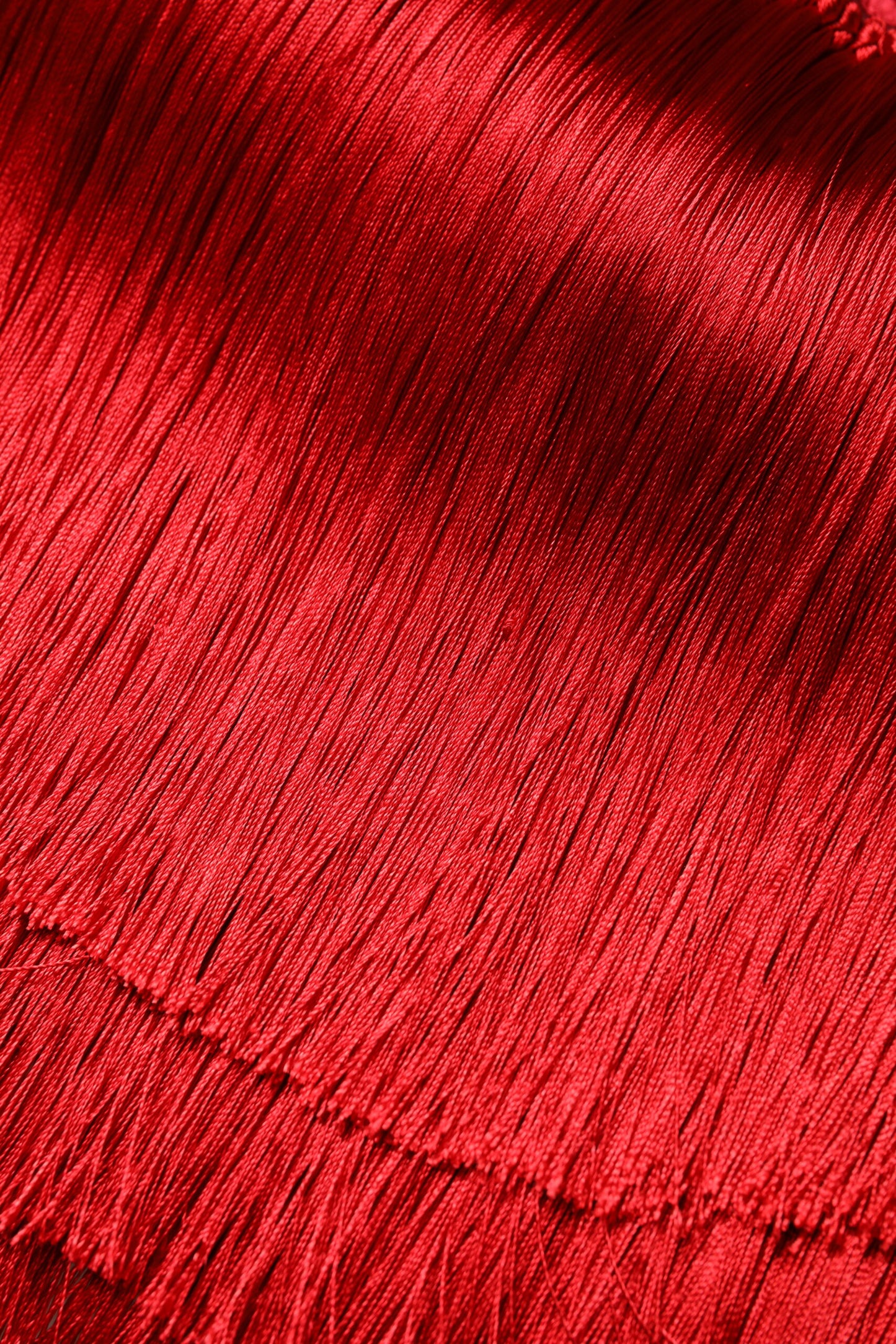 Top corto tipo tubo sin tirantes de seda roja con flecos Dolce & Gabbana