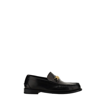 Mocasines sin cordones de piel de becerro negra Bos Taurus de Versace