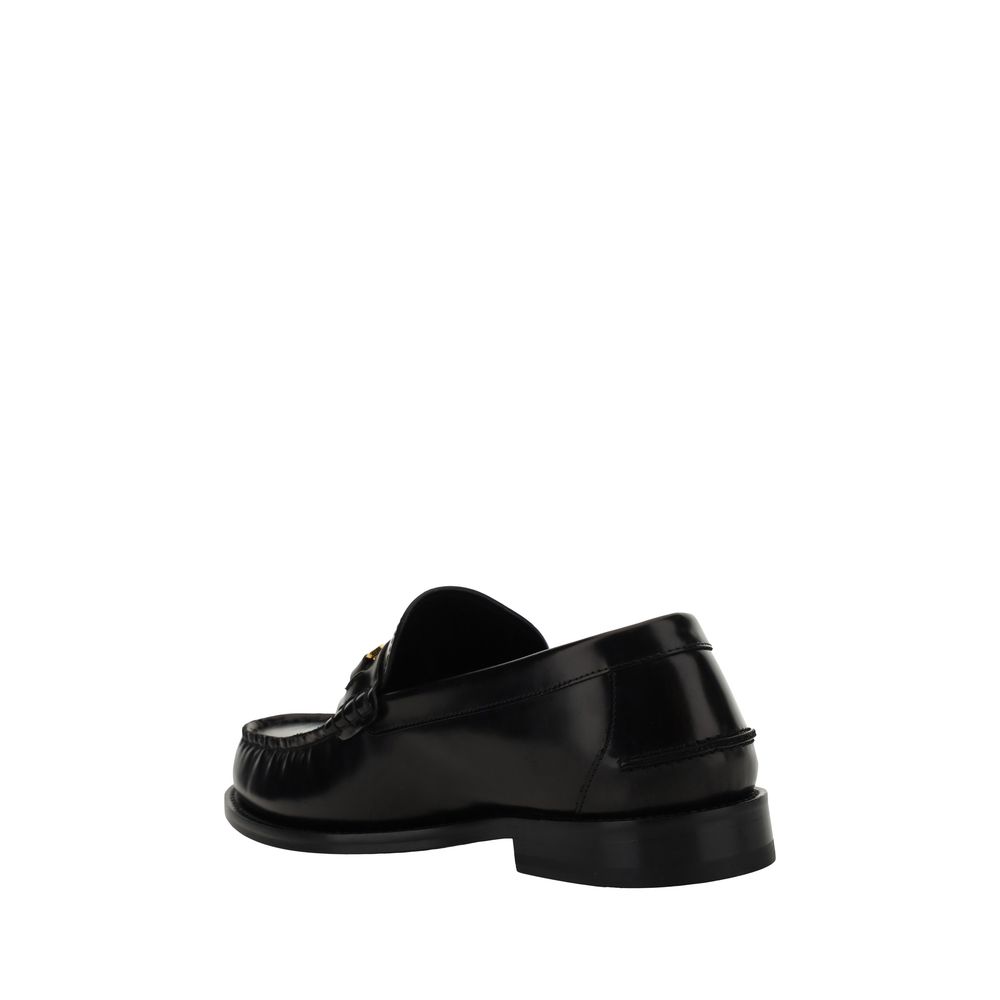 Mocasines sin cordones de piel de becerro negra Bos Taurus de Versace