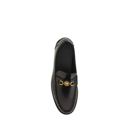 Mocasines sin cordones de piel de becerro negra Bos Taurus de Versace