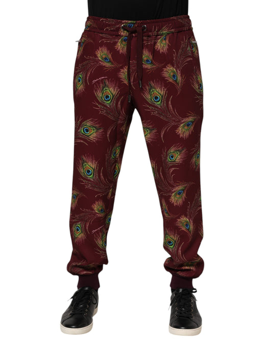 Pantalón de chándal Dolce & Gabbana con estampado de plumas de pavo real en burdeos