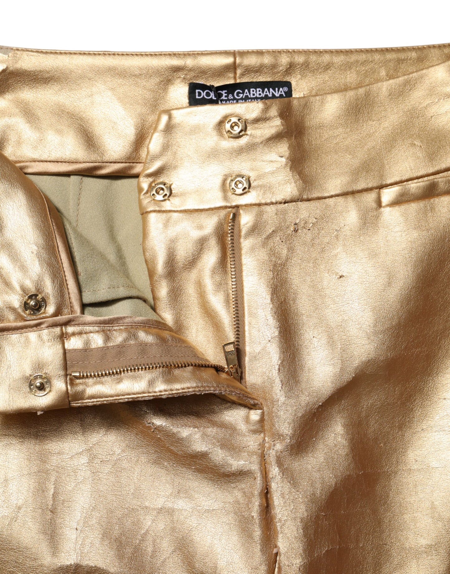 Dolce & Gabbana Pantalones pitillo de cintura alta en oro metalizado