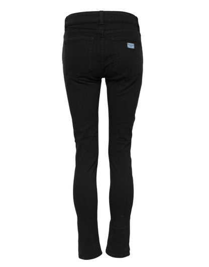 Jeans de mezclilla ajustados de tiro medio con logo de algodón negro Dolce & Gabbana